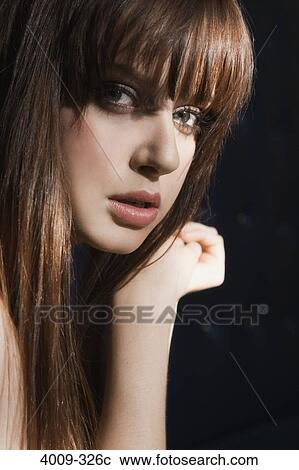 Portrait of a woman posing View Large Photo Image Stock Image - Portrait of a woman posing. Fotosearch