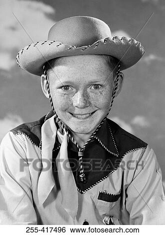 Portrait of boy wearing cowboy costume View Large Photo Image Stock Photograph - Portrait of boy wearing cowboy costume. Fotosearch