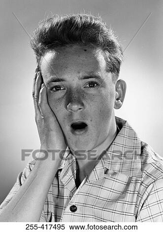 Stock Photography - Portrait of boy with open mouth. Fotosearch