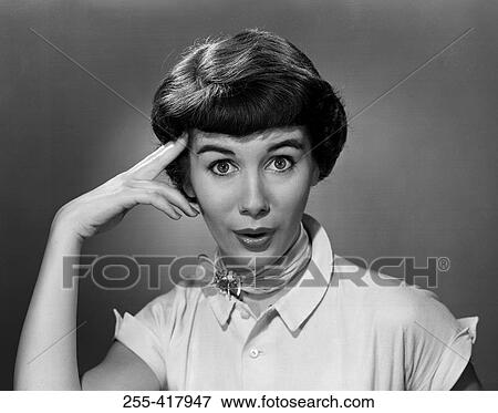 Stock Photo - Portrait of contemplative young woman. Fotosearch