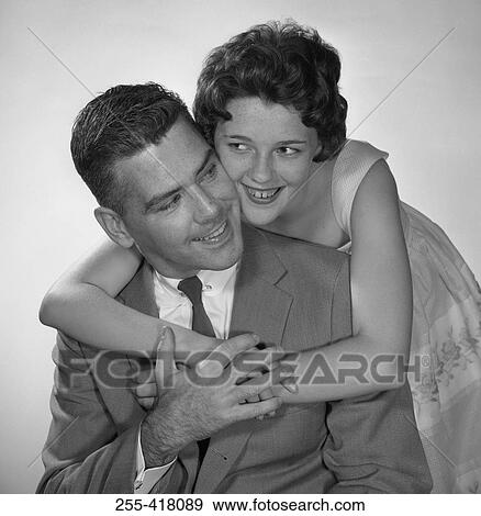 Stock Photo - Portrait of couple embracing. Fotosearch