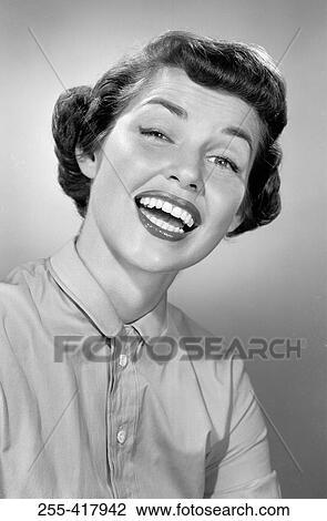 Portrait of happy young woman View Large Photo Image Stock Image - Portrait of happy young woman. Fotosearch