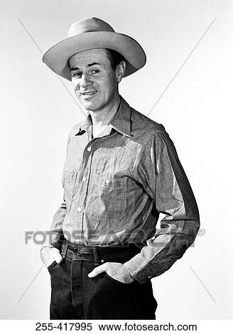 Stock Photography - Portrait of mature cowboy hat. Fotosearch