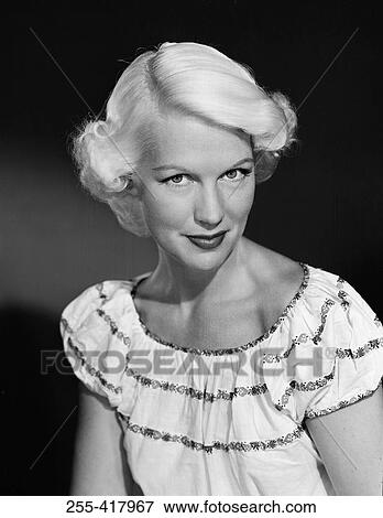 Portrait of mid adult blond woman View Large Photo Image Stock Photo - Portrait of mid adult blond woman. Fotosearch
