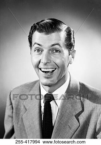 Picture - Portrait of mid adult man laughing. Fotosearch