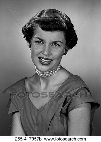 Portrait of mid adult woman smiling View Large Photo Image Stock Image - Portrait of mid adult woman smiling. Fotosearch