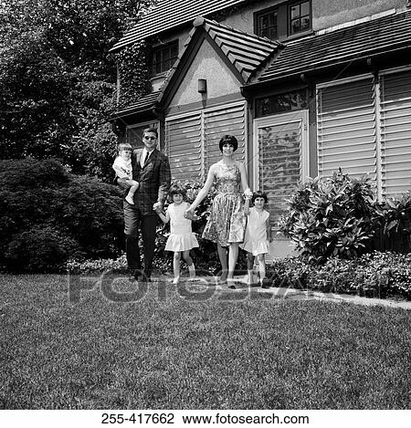 Portrait of parents with daughters in garden View Large Photo Image Stock Image - Portrait of parents with daughters in garden. Fotosearch