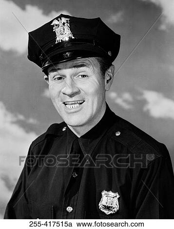 Portrait of police officer smiling View Large Photo Image Stock Image - Portrait of police officer smiling. Fotosearch