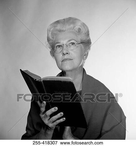 Portrait of senior woman reading book View Large Photo Image Stock Photo - Portrait of senior woman reading book. Fotosearch