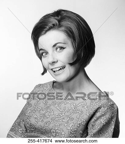 Picture - Portrait of surprised young woman. Fotosearch