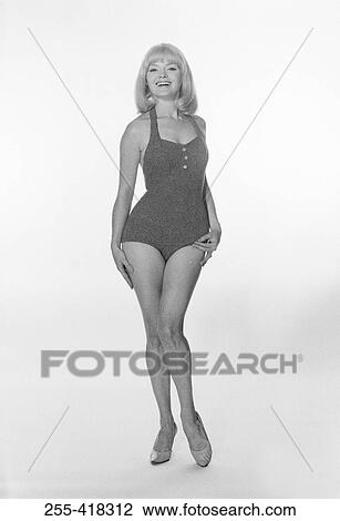 Portrait of woman wearing swimming suit View Large Photo Image Stock Image - Portrait of woman wearing swimming suit. Fotosearch