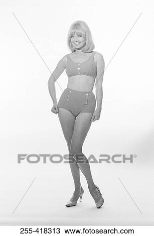 Stock Image - Portrait of woman wearing swimming suit. Fotosearch