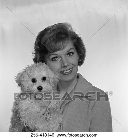 Portrait of woman with small dog View Large Photo Image Stock Photograph - Portrait of woman with small dog. Fotosearch