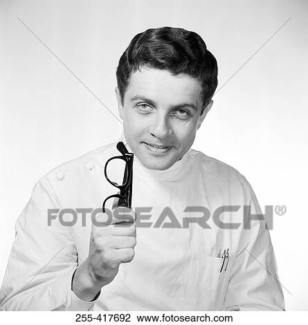 Stock Image - Portrait of young doctor. Fotosearch