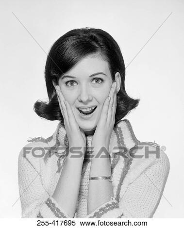 Stock Photography - Portrait of young exhilarated young woman. Fotosearch