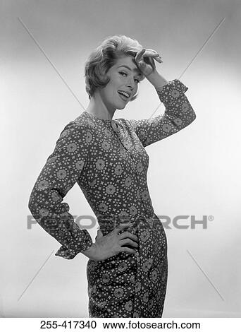 Stock Image - Portrait of young smiling woman. Fotosearch