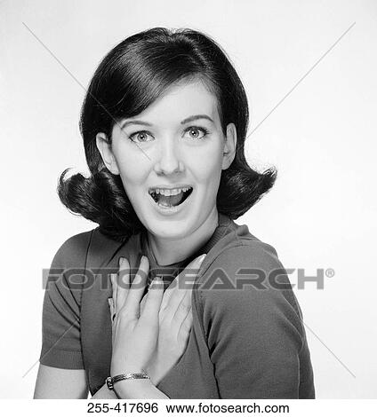 Portrait of young surprised young woman View Large Photo Image Stock Photograph - Portrait of young surprised young woman. Fotosearch