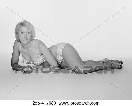Portrait of young woman in underwear View Large Photo Image Stock Image - Portrait of young woman in underwear. Fotosearch