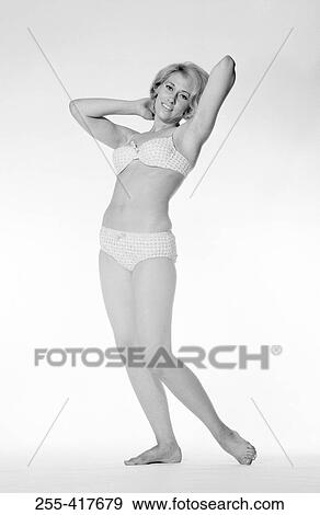 Stock Photo - Portrait of young woman in underwear. Fotosearch