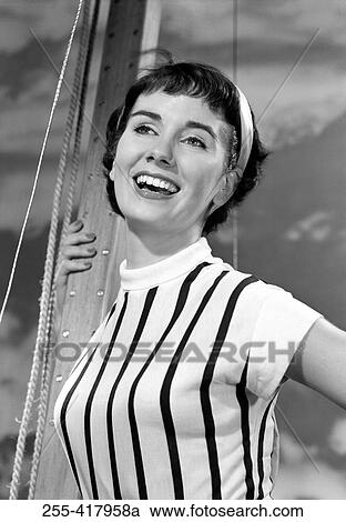 Portrait of young woman on sailing boat View Large Photo Image Stock Image - Portrait of young woman on sailing boat. Fotosearch