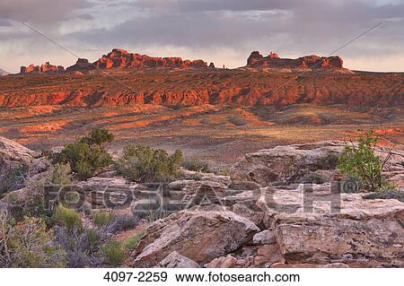Stock Photo - Rock formations in a canyon, Salt Valley, Arches National Park, Utah, USA. Fotosearch
