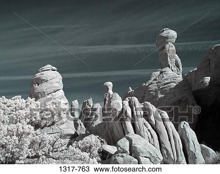 Rock formations in a desert, Marching Men, Tower Arch, Arches National Park, Utah, USA View Large Photo Image Stock Image - Rock formations in a desert, Marching Men, Tower Arch, Arches National Park, Utah, USA. Fotosearch