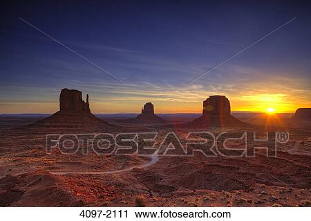 Rock formations in a desert, Monument Valley, Arizona-Utah, USA View Large Photo Image Stock Image - Rock formations in a desert, Monument Valley, Arizona-Utah, USA. Fotosearch