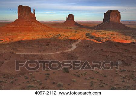 Rock formations in a desert, Monument Valley, Arizona-Utah, USA View Large Photo Image Stock Image - Rock formations in a desert, Monument Valley, Arizona-Utah, USA. Fotosearch