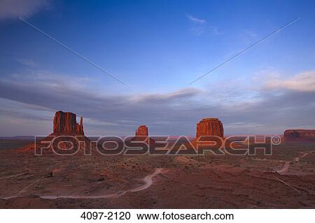 Stock Image - Rock formations in a desert, Monument Valley, Arizona-Utah, USA. Fotosearch