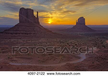 Stock Image - Rock formations in a desert, Monument Valley, Arizona-Utah, USA. Fotosearch