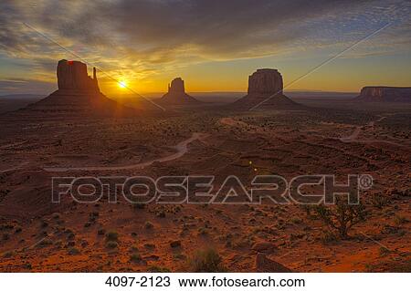 Rock formations in a desert, Monument Valley, Arizona-Utah, USA View Large Photo Image Stock Image - Rock formations in a desert, Monument Valley, Arizona-Utah, USA. Fotosearch