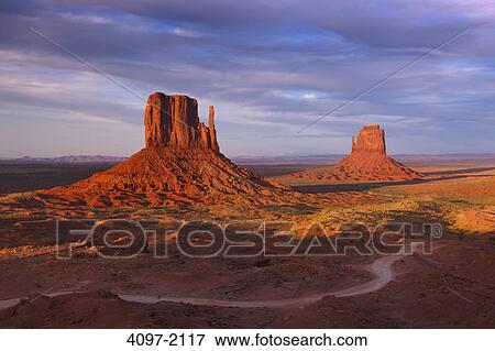 Stock Photo - Rock formations in a desert, Monument Valley, Arizona-Utah, USA. Fotosearch