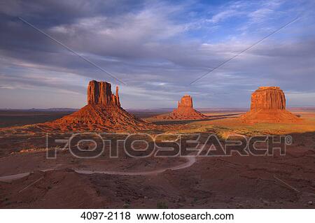 Rock formations in a desert, Monument Valley, Arizona-Utah, USA View Large Photo Image Stock Photo - Rock formations in a desert, Monument Valley, Arizona-Utah, USA. Fotosearch