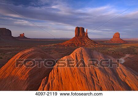 Stock Photo - Rock formations in a desert, Monument Valley, Arizona-Utah, USA. Fotosearch