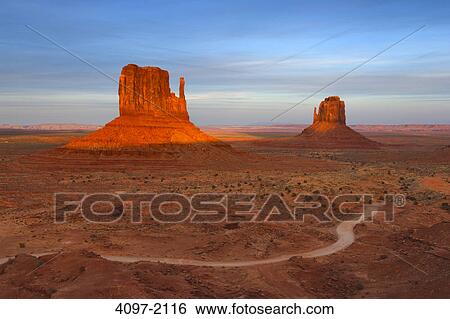 Stock Photograph - Rock formations in a desert, Monument Valley, Arizona-Utah, USA. Fotosearch