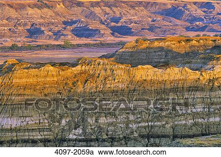 Rock formations on a landscape, Drumheller, Alberta, Canada View Large Photo Image Stock Image - Rock formations on a landscape, Drumheller, Alberta, Canada. Fotosearch