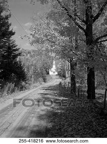 Stock Photograph - Rural road to church. Fotosearch