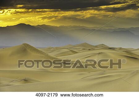 Sand dunes in a desert, Death Valley National Park, California, USA View Large Photo Image Stock Photo - Sand dunes in a desert, Death Valley National Park, California, USA. Fotosearch