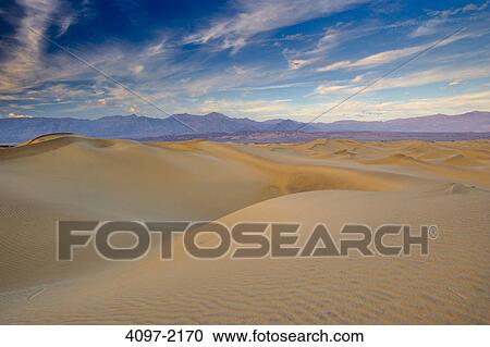 Stock Image - Sand dunes in a desert, Mesquite Flat Dunes, Death Valley National Park, California, USA. Fotosearch