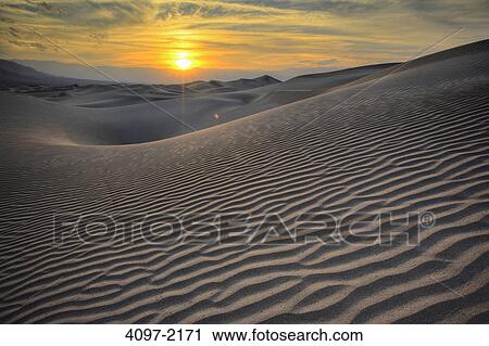 Sand dunes in a desert, Mesquite Flat Dunes, Death Valley National Park, California, USA View Large Photo Image Stock Image - Sand dunes in a desert, Mesquite Flat Dunes, Death Valley National Park, California, USA. Fotosearch