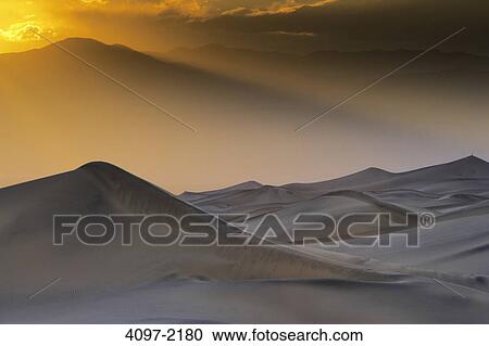 Sand dunes in a desert, Mesquite Flat Dunes, Death Valley National Park, California, USA View Large Photo Image Stock Image - Sand dunes in a desert, Mesquite Flat Dunes, Death Valley National Park, California, USA. Fotosearch