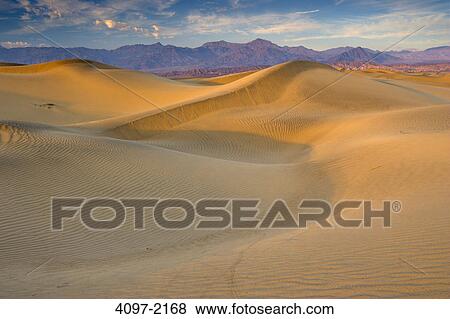 Sand dunes in a desert, Mesquite Flat Dunes, Death Valley National Park, California, USA View Large Photo Image Stock Photo - Sand dunes in a desert, Mesquite Flat Dunes, Death Valley National Park, California, USA. Fotosearch