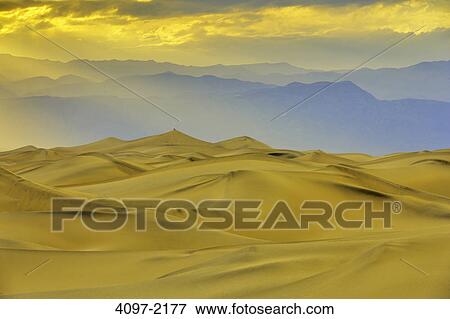 Sand dunes in a desert, Mesquite Flat Dunes, Death Valley National Park, California, USA View Large Photo Image Stock Photo - Sand dunes in a desert, Mesquite Flat Dunes, Death Valley National Park, California, USA. Fotosearch