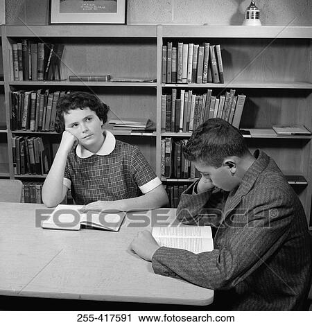 School children reading in library View Large Photo Image Stock Image - School children reading in library. Fotosearch