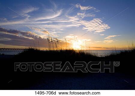 Sea at sunset, Venice Fishing Pier, Venice Beach, Venice, Gulf Of Mexico, Sarasota County, Florida, USA View Large Photo Image Stock Image - Sea at sunset, Venice Fishing Pier, Venice Beach, Venice, Gulf Of Mexico, Sarasota County, Florida, USA. Fotosearch