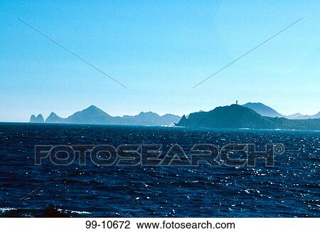 Sea with a mountain range in the background, Punta Ballena, Cabo San Lucas, Baja California, Mexico View Large Photo Image Stock Image - Sea with a mountain range in the background, Punta Ballena, Cabo San Lucas, Baja California, Mexico. Fotosearch
