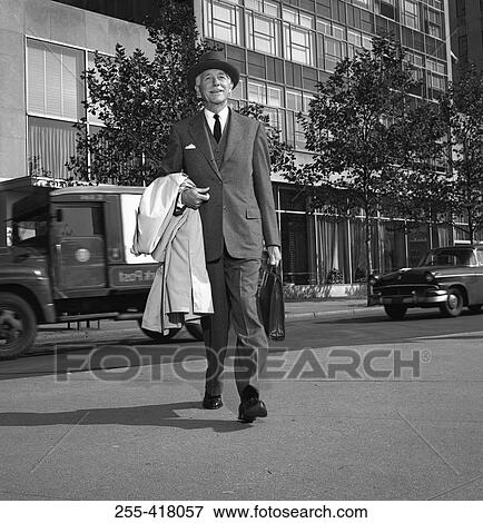 Senior man crossing street View Large Photo Image Stock Photo - Senior man crossing street. Fotosearch