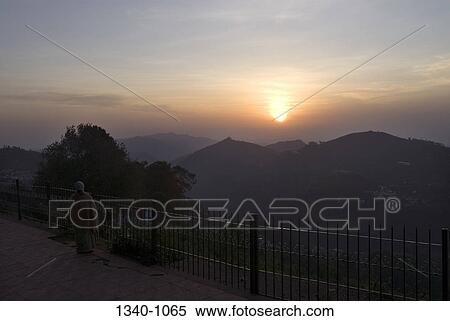 Silhouette of mountains at sunrise, Coaker's Walk, Kodaikanal, Tamil Nadu, India View Large Photo Image Stock Photography - Silhouette of mountains at sunrise, Coaker's Walk, Kodaikanal, Tamil Nadu, India. Fotosearch