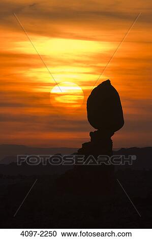 Stock Image - Silhouette of rocks, Balanced Rock, Arches National Park, Utah, USA. Fotosearch