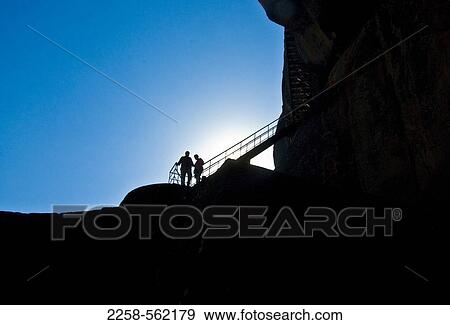Silhouette of tourists on stairway, Sigiriya, Matale District, Sri Lanka View Large Photo Image Stock Photo - Silhouette of tourists on stairway, Sigiriya, Matale District, Sri Lanka. Fotosearch